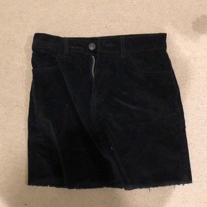 black brandy melville mini skirt